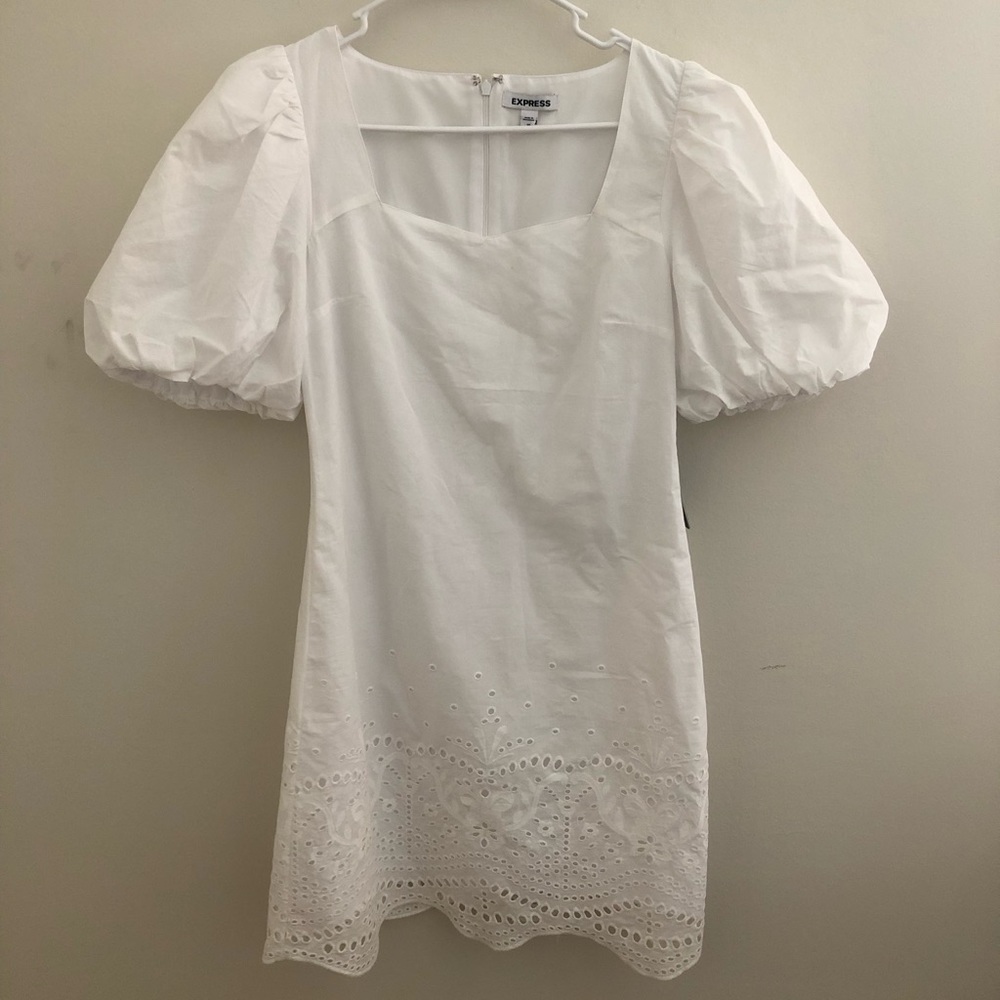 Brand new with tags Express white dress! Size xs. Short length with puff sleeves